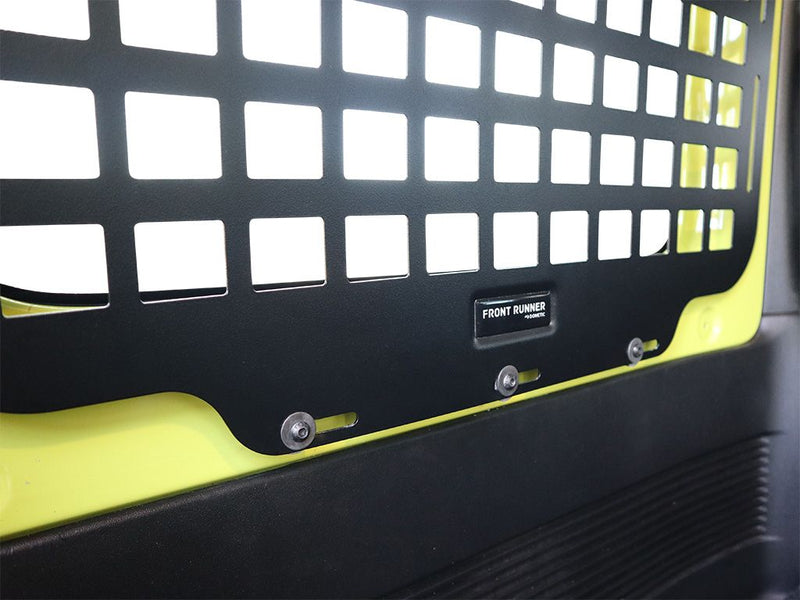Load image into Gallery viewer, Black and yellow Front Runner Molle Panel for 2018-current Suzuki Jimny 3 Door rear window, vehicle storage accessory.
