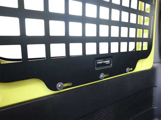 Black and yellow Front Runner Molle Panel for 2018-current Suzuki Jimny 3 Door rear window, vehicle storage accessory.