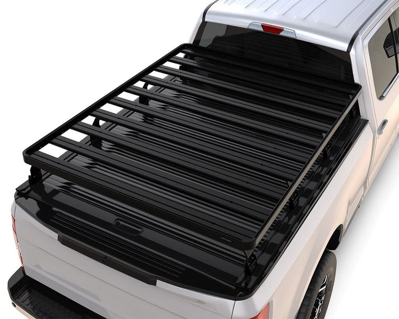 Load image into Gallery viewer, Front Runner Ford F-150 Retrax XR 6&#39;6 Slimline II Load Bed Rack Kit installed on a white Ford F-150 truck bed
