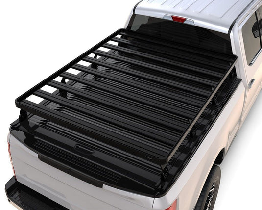 Front Runner Ford F-150 Retrax XR 6'6 Slimline II Load Bed Rack Kit installed on a white Ford F-150 truck bed