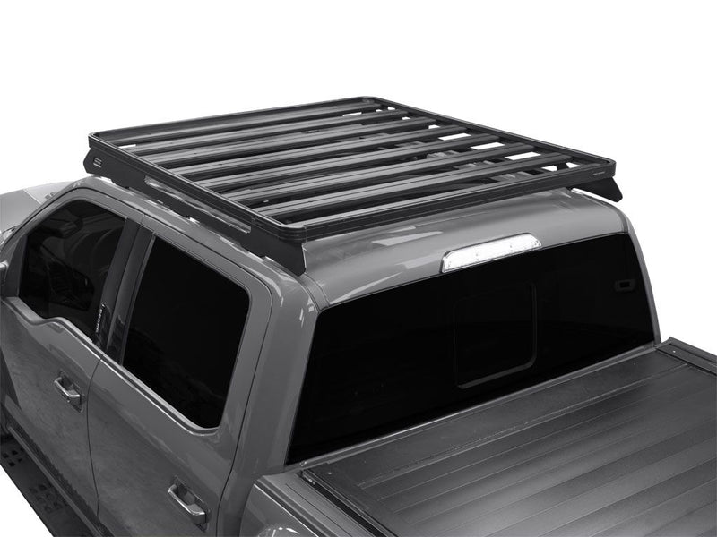 Load image into Gallery viewer, Slimline II Roof Rack Kit installed on Ford F150 Crew Cab 2009-Current model, heavy-duty cargo storage system for trucks.
