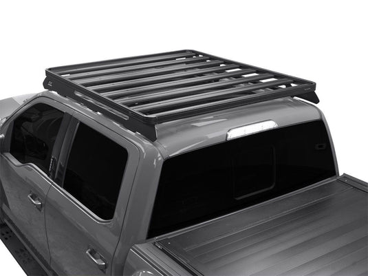 Slimline II Roof Rack Kit installed on Ford F150 Crew Cab 2009-Current model, heavy-duty cargo storage system for trucks.