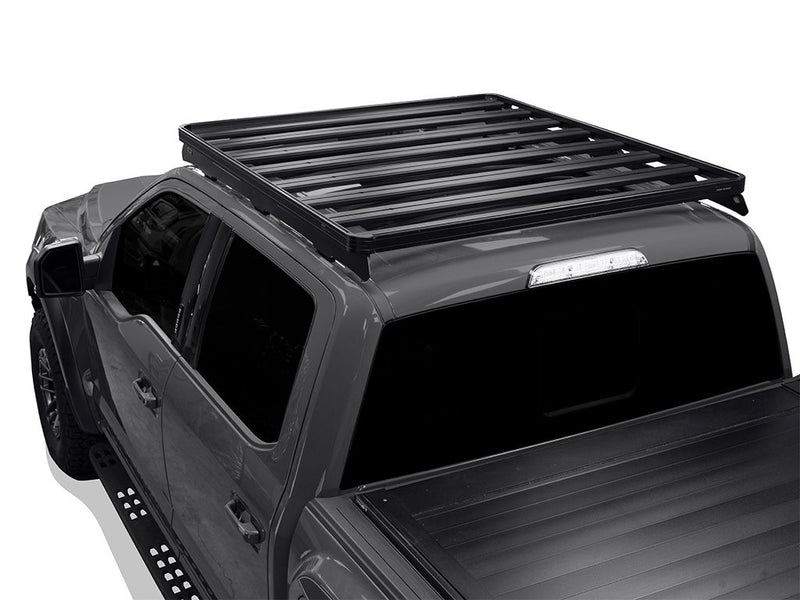 Load image into Gallery viewer, Front Runner Slimline II Roof Rack Kit mounted on a Ford F150 Raptor, low profile design, for models 2009 to current.
