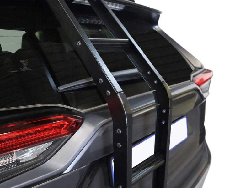Load image into Gallery viewer, Rear view of a Toyota RAV4 (2019) with a Front Runner ladder attached to the back door.

