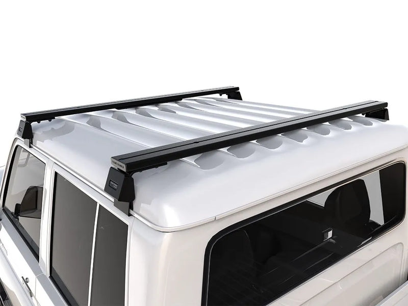 Load image into Gallery viewer, Front Runner Toyota Hilux DC (1988-1997) Load Bar Kit / Gutter Mount
