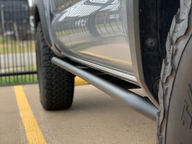 Load image into Gallery viewer, Cali Raised LED 2005-2021 Toyota Tacoma Trail Edition Rock Sliders

