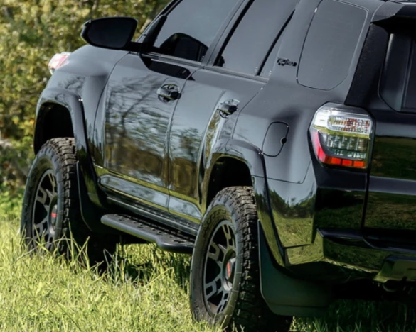 Load image into Gallery viewer, Cali Raised LED 2010-2021 Toyota 4Runner Step Edition Bolt On Rock Sliders
