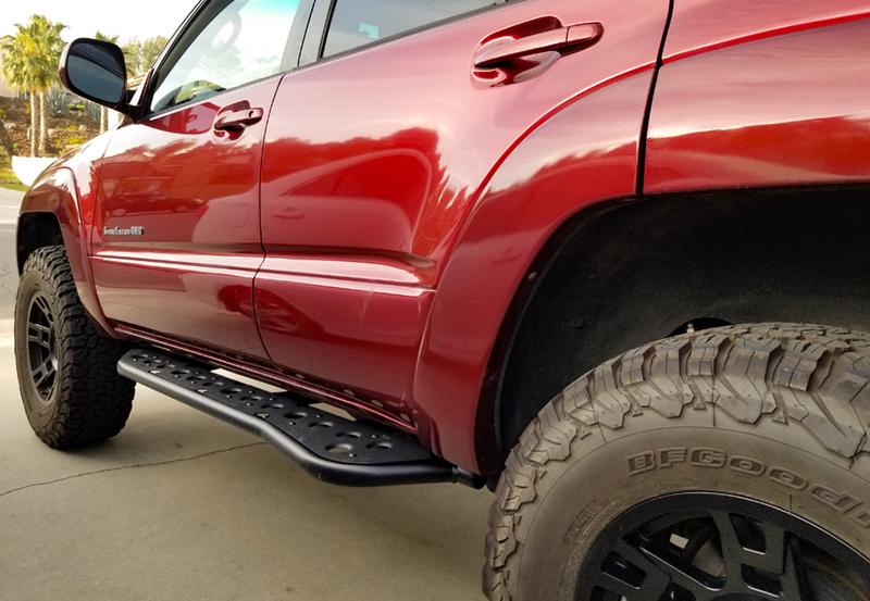 Load image into Gallery viewer, Cali Raised LED 2010-2024 Toyota 4Runner Step Edition Bolt On Rock Sliders
