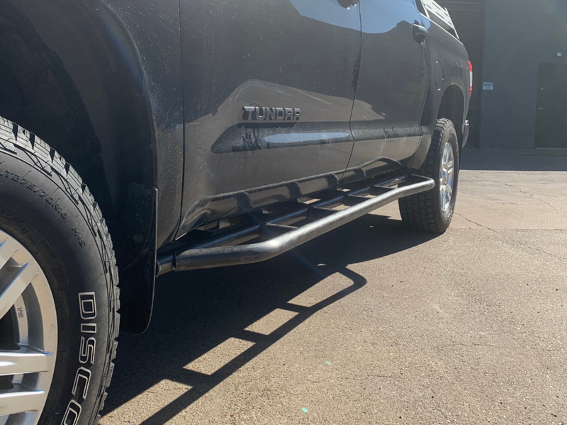 Load image into Gallery viewer, Cali Raised LED 2014-2021 Toyota Tundra Step Edition Rock Sliders
