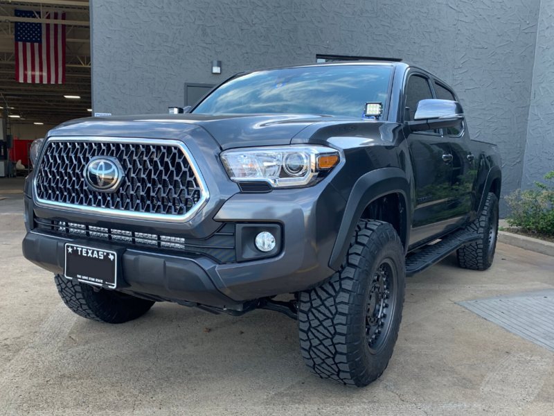 Load image into Gallery viewer, Cali Raised LED 2005-2022 Toyota Tacoma Step Edition Rock Sliders
