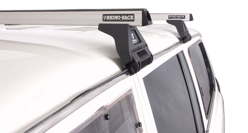 Load image into Gallery viewer, Rhino Rack Heavy Duty RL110 Silver 4 Bar Roof Rack - 80 Series Land Cruiser
