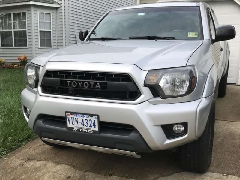 Load image into Gallery viewer, Cali Raised LED 2012-2015 Toyota Tacoma Faux Pro Grille
