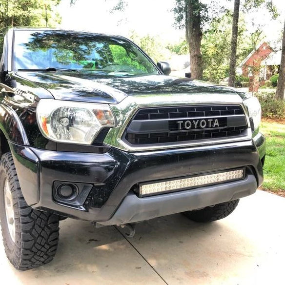 Load image into Gallery viewer, Cali Raised LED 2012-2015 Toyota Tacoma Faux Pro Grille
