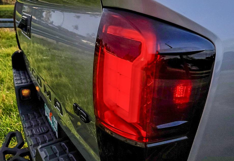 Load image into Gallery viewer, Cali Raised LED 2016-2022 Toyota Tacoma Raptor Style Tail Lights *Sold as Pair*
