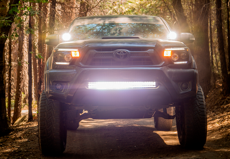 Load image into Gallery viewer, Cali Raised LED 2005-2015 Toyota Tacoma Low Profile LED Ditch Light Brackets Kit
